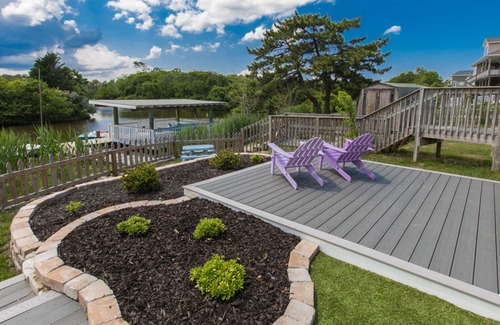 Sandbridge House | Designer beach house with incomparable bay views, foosball table, dock, AC