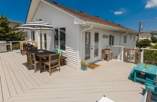 Sandbridge House | Designer beach house with incomparable bay views, foosball table, dock, AC