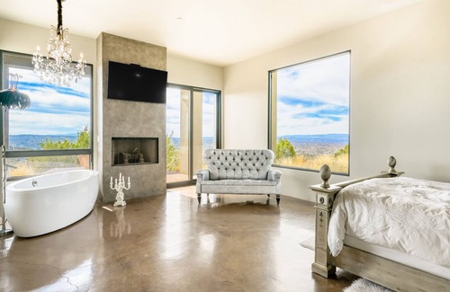 Santa Fe House | Designer desert stay on 45 acres with grand views, patio, soaking tub & W/D