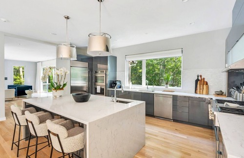 Water Mill House | Designer Gut Renovated Farmhouse on over 1 Acre, Numerous Spacious Living.
