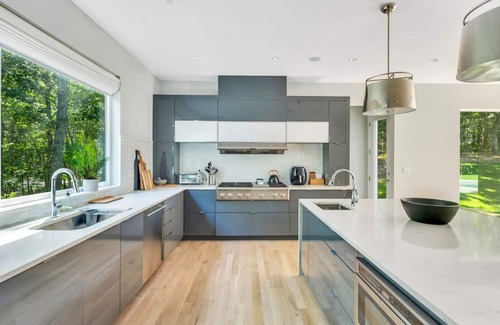 Water Mill House | Designer Gut Renovated Farmhouse on over 1 Acre, Numerous Spacious Living.