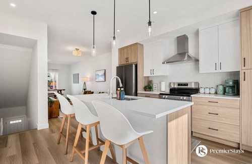 Springbank Hill House | Designer-Inspired Home » King Bed » Garage » AC