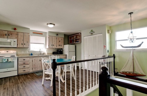 Anna Maria House | Desirable North-End Gem on Canal with Dock, Heated Pool. Clean and Spacious.