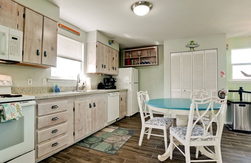 Anna Maria House | Desirable North-End Gem on Canal with Dock, Heated Pool. Clean and Spacious.