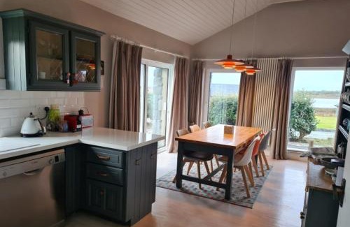 Ballyconneely House | Detached cottage overlooking lake in Connemara