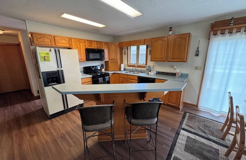 Manitou Beach-Devils Lake House | Devils Lake Vacation Home with 20 feet of Lake Frontage