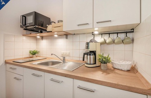 Garz Apartment | DHH Emil - Modern semi-detached house with terrace and garden furniture