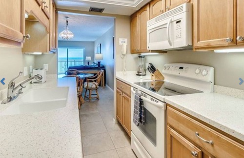 Madeira Beach Condo | DIRECT BEACHFRONT CONDO Pool, Beautifully Renovated 2 Bedroom 4th Floor Balcony.