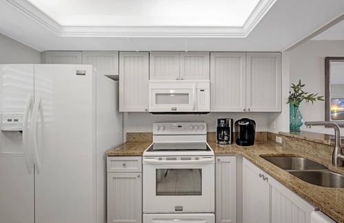 New Smyrna Beach Condo | Direct oceanfront condo with private balcony, heated beachfront pool, and beach access