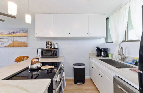 Hilo Condo | Direct Oceanfront Mauna Loa Shores #508 New Remodel next to Beach Park