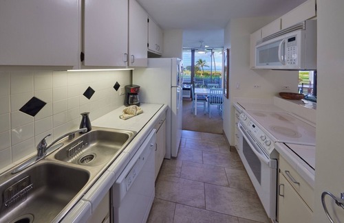 Kihei Condo | Direct oceanfront steps from the beach, pool, bbqs and sunsets.!