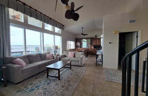 Boys Works House | Directly on Intracoastal Sunsets on the East Coast, king beds in every bedroom!