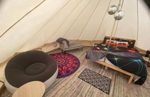 Newark Other | Disco tent secret garden glamping