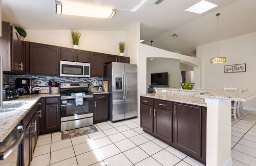 Windsor Palms House | Discover magic just 9 mins away! Spacious 5-bed Kissimmee retreat, pool and spa