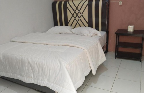 Ambarita Hotel | DK CAFE & INN