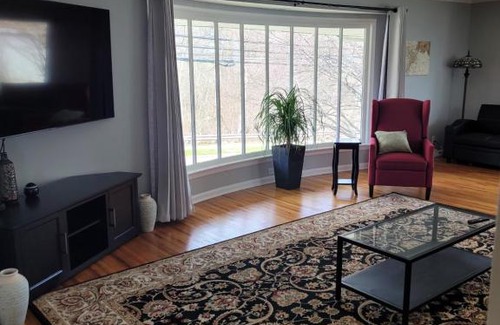 Toledo House | dock, game room, bar and private river view patio