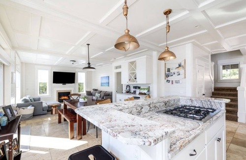 Roads End House | Dockside on Devil’s Lake, hot tub, dock, fire pits, game & family rooms, Pets OK