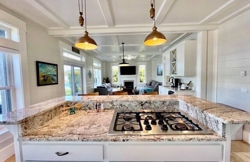 Roads End House | Dockside on Devil’s Lake, hot tub, dock, fire pits, game & family rooms, Pets OK