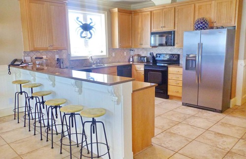 East End House | Dog-friendly beachfront retreat with elevator, grill, on-site pool, tennis court