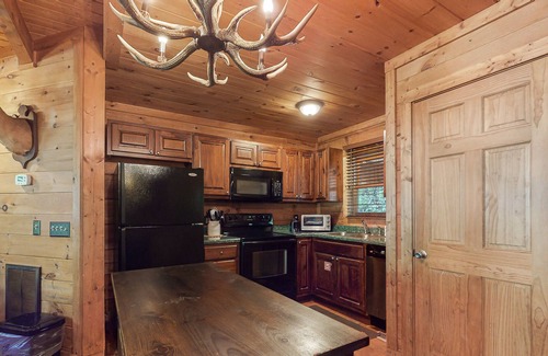 Sevierville Cabin | Dog-friendly cabin with private hot tub, gas fireplace, WiFi, and central AC