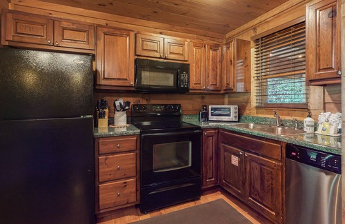 Sevierville Cabin | Dog-friendly cabin with private hot tub, gas fireplace, WiFi, and central AC