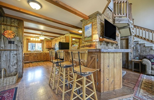 Accident House | Dog-friendly cabin with firepit, deck, private hot tub, fireplace