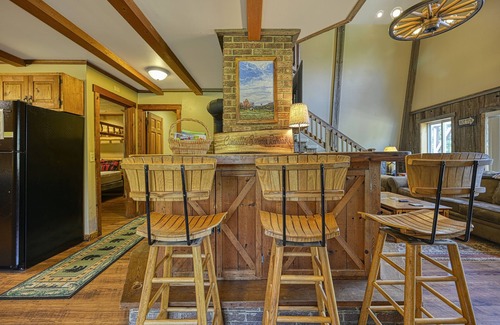 Accident House | Dog-friendly cabin with firepit, deck, private hot tub, fireplace