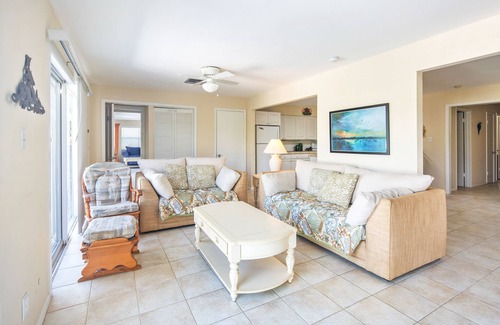 Marathon House | Dog-friendly, canal-front home with seawall dock, heated pool & gas grills