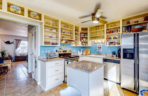 Atlantic Beach Condo | Dog-friendly coastal retreat with games, W/D, & patio - walk to the beach