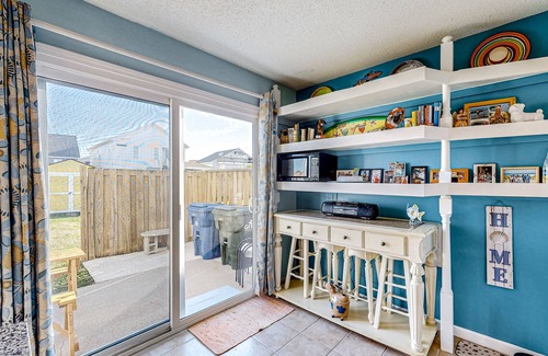 Atlantic Beach Condo | Dog-friendly coastal retreat with games, W/D, & patio - walk to the beach
