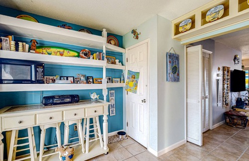 Atlantic Beach Condo | Dog-friendly coastal retreat with games, W/D, & patio - walk to the beach