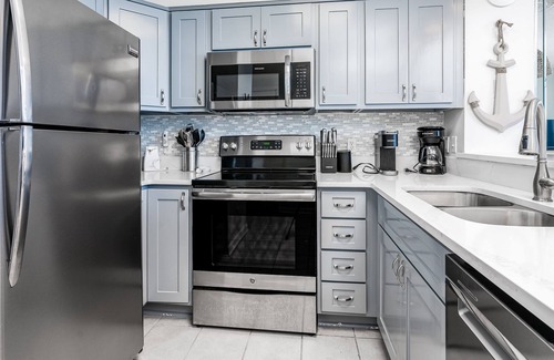 Orange Beach Condo | Dog-friendly condo in beachfront resort with pool, central AC, & gas grill