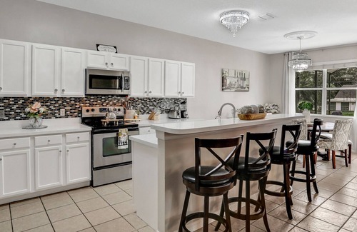 Windwood Bay House | Dog-friendly delight with private pool, spa, screened lanai, washer/dryer, & AC