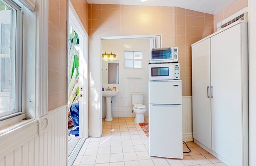 Historic Seaport House | Dog-friendly downtown home & casita with patio, W/D, & central/partial AC