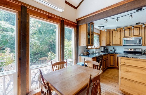 Waldport House | Dog-friendly garden cottage with a deck, firepit, & wood stove - near the beach