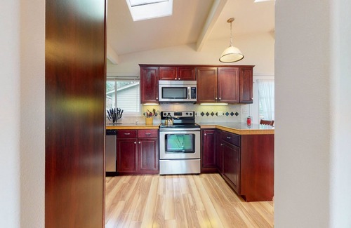 South Beach House | Dog-friendly home near the beach - private hot tub, wood-burning fireplace & W/D