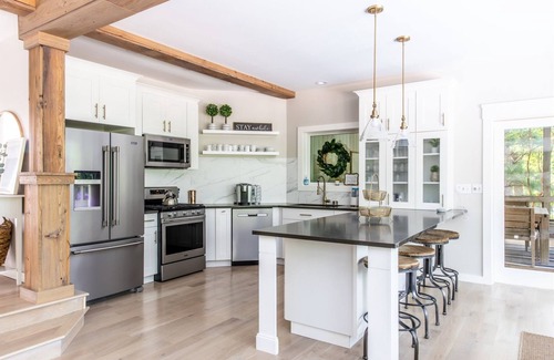Grand Beach House | Dog-friendly house with private heated outdoor pool, hot tub & Ping-Pong