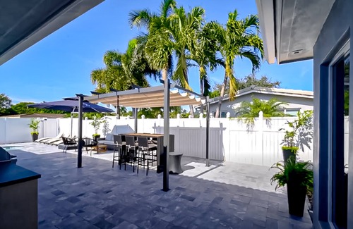 Coral Heights House | Dog-friendly house with patio, private outdoor pool, enclosed yard, & grill