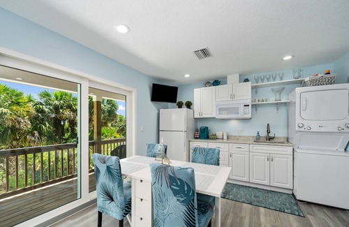 New Smyrna Beach House | Dog Friendly Loft STEPS from Beach with Gas Barbecue Grill and Upstairs Deck!