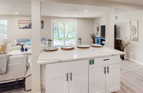 Shoreline House | Dog-friendly lakefront getaway with a kitchenette, furnished patio, & fast WiFi