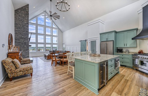 Mineral House | Dog-friendly, lakefront home with boathouse, deck, game room, grill & balcony