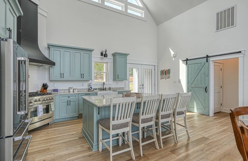 Mineral House | Dog-friendly, lakefront home with boathouse, deck, game room, grill & balcony