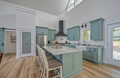 Mineral House | Dog-friendly, lakefront home with boathouse, deck, game room, grill & balcony