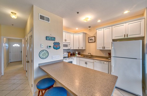 Hatteras Condo | Dog-friendly oceanfront condo with balcony, outdoor pool, hot tub, and central AC