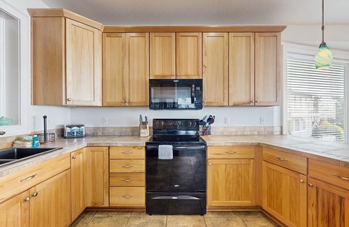 Roads End House | Dog-friendly oceanview house with private hot tub, 2 decks, & close beach access