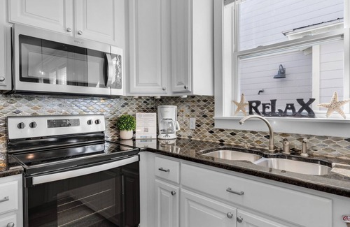Seacrest Beach House | Dog-Friendly Seacrest Home, Pool, Beach Tram + Free Attraction Tickets!