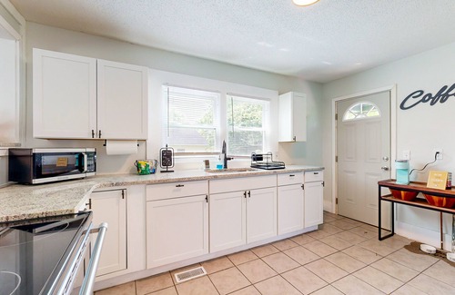 Burlington House | Dog-friendly spacious home near lake & town with fireplace & private backyard