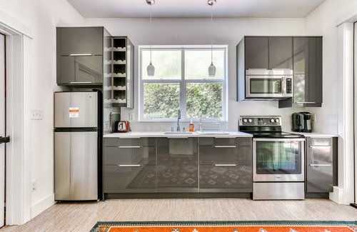 Stevenson House | Dog-friendly studio with river view, patio, grill, & shared W/D