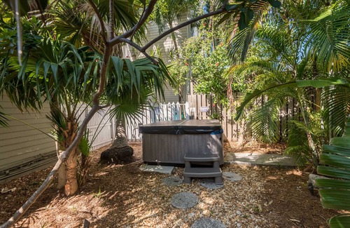 Uptown - Upper Duval House | Dog-friendly suite with hot tubs, central AC & patio