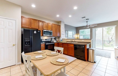 Crestwynd Bay House | Dog-friendly townhouse near Disney with outdoor pool, patio, streaming, W/D, AC
